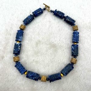 Dark blue Sodalite stone hand engraved with brass details neckless.